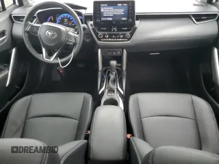 2022 Toyota Corolla Cross XLE с VIN 7MUDAAAG0NV006925, выставлен на аукционе Copart как лот 57719495 с пробегом 38 973 миль миль и Списание • Salvage title. История ставок и продаж доступна на DreamBid. Изображение 8.