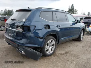 2021 Volkswagen Atlas SE z VIN 1V2WR2CA7MC568779, wystawiony jako IAAI lot #42132709 z przebiegiem 51 205 mil mil oraz . Historia ofert i sprzedaży dostępna na DreamBid. Obrazek 4.