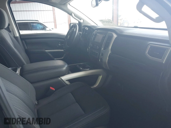 2018 Nissan Titan SV with VIN 1N6AA1E63JN512230, listed as a IAAI auction lot 42000705 with 64,479 mi miles and . Bid and sale history available at DreamBid. Image 5.