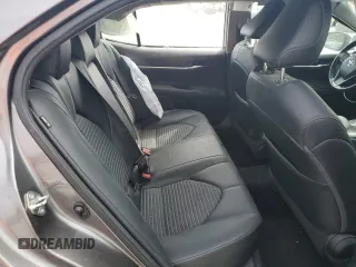 2020 Toyota Camry SE z VIN 4T1G11AK8LU927869, wystawiony jako Copart lot #57242235 z przebiegiem 85 487 mil mil oraz Szkoda całkowita • Salvage title. Historia ofert i sprzedaży dostępna na DreamBid. Obrazek 10.