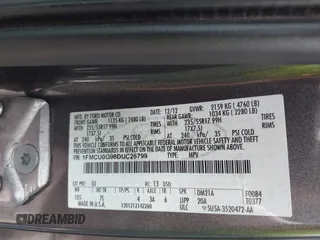2013 Ford Escape SE with VIN 1FMCU0G96DUC26799, listed as a IAAI auction lot 42751599 with 116,312 mi miles and . Bid and sale history available at DreamBid. Image 9.