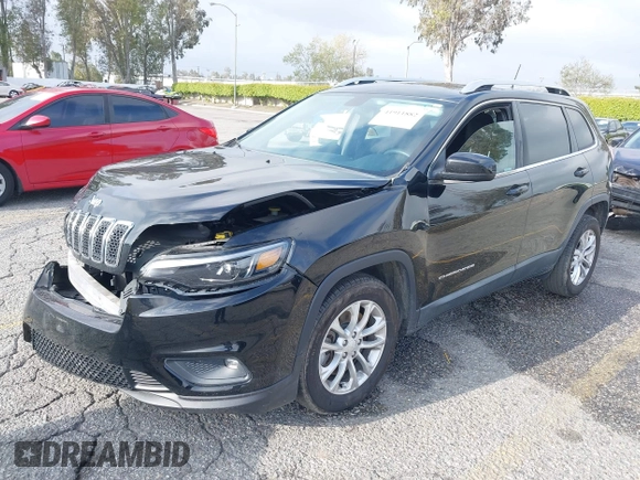 2019 Jeep Cherokee Latitude with VIN 1C4PJLCB8KD215423, listed as a IAAI auction lot 41911882 with 76,965 mi miles. Bid and sale history available at carsss.com. Image 2.