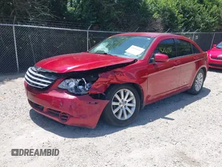 2010 Chrysler Sebring Limited with VIN 1C3CC5FB8AN133656, listed as a IAAI auction lot 42561161 with 145,785 mi miles and . Bid and sale history available at DreamBid. Image 2.