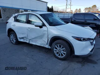 2023 Mazda CX-5 2.5 S with VIN JM3KFBAM6P0269481, listed as a Copart auction lot 87222194 with 21,070 mi miles and Salvage Title. Bid and sale history available at carsss.com. Image 4.