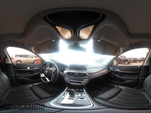 2020 BMW 7 Series 740i z VIN WBA7T2C07LCE11573, wystawiony jako IAAI lot #42474689 z przebiegiem 63 015 mil mil oraz . Historia ofert i sprzedaży dostępna na DreamBid. Obrazek 18.