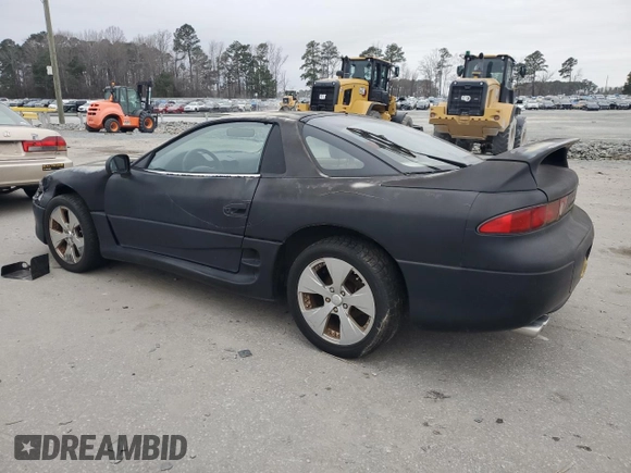1998 Mitsubishi 3000GT z VIN JA3AM44H8WY000594, wystawiony jako Copart lot #44164155 z przebiegiem 92 227 mil mil oraz Czysty tytuł • Clean title. Historia ofert i sprzedaży dostępna na DreamBid. Obrazek 2.