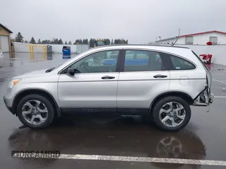 2009 Honda CR-V LX with VIN 5J6RE48379L031525, listed as a IAAI auction lot 41851336 with 233,042 mi miles. Bid and sale history available at carsss.com. Image 15.