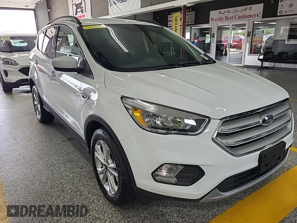 2018 Ford Escape SE z VIN 1FMCU9GD3JUC89119, wystawiony jako IAAI lot #42421139 z przebiegiem 42 209 mil mil oraz . Historia ofert i sprzedaży dostępna na DreamBid. Obrazek 3.