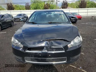 2012 Mitsubishi Lancer SE with VIN JA32V2FW8CU006609, listed as a Copart auction lot 56335965 with 128,218 mi miles and Salvage title. Bid and sale history available at DreamBid. Image 5.