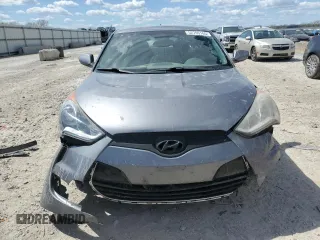 2014 Hyundai Veloster z VIN KMHTC6AD3EU215750, wystawiony jako Copart lot #52769165 z przebiegiem 114 364 mil mil oraz Szkoda całkowita • Salvage title. Historia ofert i sprzedaży dostępna na DreamBid. Obrazek 5.