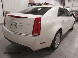 2008 Cadillac CTS AWD w/1SB with VIN 1G6DS57V880139916, listed as a IAAI auction lot 41302359 with 118,078 mi miles. Bid and sale history available at carsss.com. Image 4.