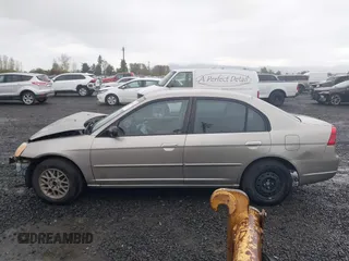 2003 Honda Civic LX with VIN 2HGES16553H620059, listed as a IAAI auction lot 41967662 with 119,918 mi miles and . Bid and sale history available at carsss.com. Image 15.