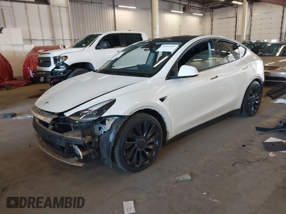 2021 Tesla Model Y Performance with VIN 5YJYGDEF4MF263473, listed as a IAAI auction lot 41851083 with 39,289 mi miles and . Bid and sale history available at DreamBid. Image 20.