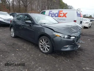 2017 Mazda 3 Touring with VIN 3MZBN1L7XHM135792, listed as a IAAI auction lot 41732569 with 81,368 mi miles and . Bid and sale history available at DreamBid. Image 1.