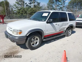 2000 Ford Explorer XLT z VIN 1FMZU83P4YUB84877, wystawiony jako IAAI lot #41719941 z przebiegiem 192 451 mil mil oraz . Historia ofert i sprzedaży dostępna na DreamBid. Obrazek 2.