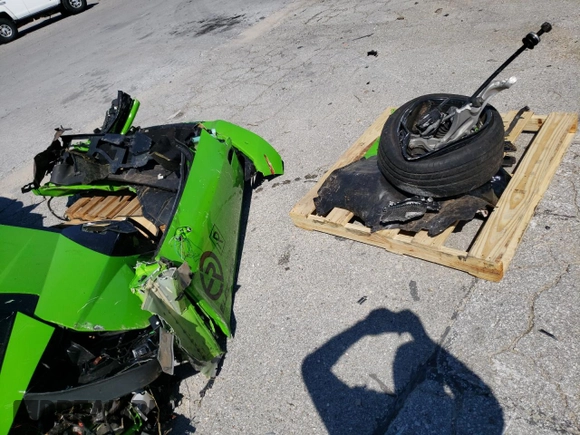 2016 Lamborghini Huracan LP 610-4 z VIN ZHWUR1ZF2GLA05076, wystawiony jako Copart lot #67934793 z przebiegiem Nie podano mil oraz Szkoda całkowita • Salvage title. Historia ofert i sprzedaży dostępna na DreamBid. Obrazek 13.