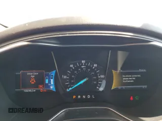 2013 Ford Fusion Titanium Hybrid z VIN 3FA6P0RUXDR376633, wystawiony jako Copart lot #57685555 z przebiegiem 133 248 mil mil oraz Szkoda całkowita • Salvage title. Historia ofert i sprzedaży dostępna na DreamBid. Obrazek 9.