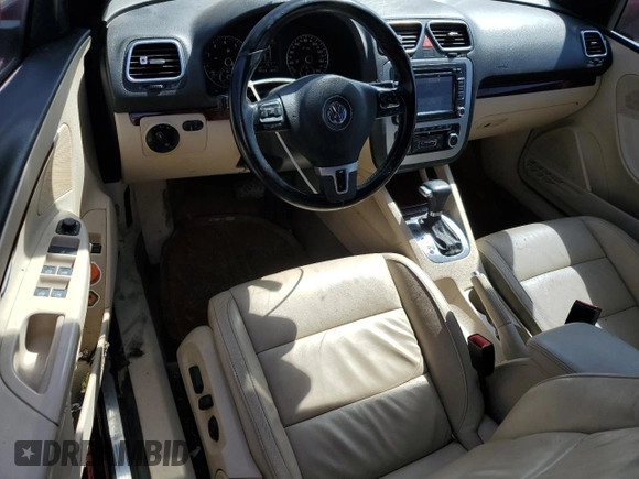 2011 Volkswagen Eos Lux с VIN WVWFA7AH5BV002336, выставлен на аукционе Copart как лот 55287125 с пробегом 95 124 миль миль и Списание • Salvage title. История ставок и продаж доступна на DreamBid. Изображение 8.