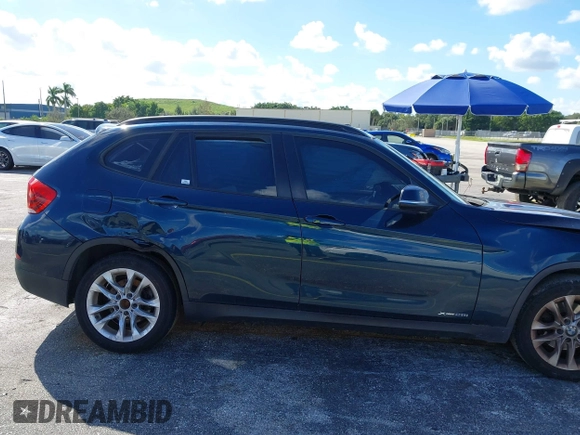 2015 BMW X1 xDrive28i z VIN WBAVL1C57FVY30820, wystawiony jako IAAI lot #40693352 z przebiegiem 111 221 mil mil oraz . Historia ofert i sprzedaży dostępna na DreamBid. Obrazek 12.
