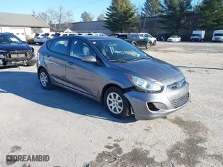 2014 Hyundai Accent GS with VIN KMHCT5AE6EU174338, listed as a IAAI auction lot 41096955 with 49,614 mi miles. Bid and sale history available at carsss.com. Image 1.