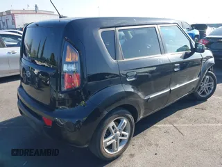 2010 Kia Soul + with VIN KNDJT2A26A7140621, listed as a IAAI auction lot 42001647 with 52,780 mi miles. Bid and sale history available at carsss.com. Image 4.