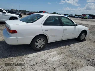 2001 Toyota Camry CE z VIN 4T1BG22KX1U795496, wystawiony jako Copart lot #59259765 z przebiegiem 87 713 mil mil oraz Czysty tytuł • Clean title. Historia ofert i sprzedaży dostępna na DreamBid. Obrazek 3.