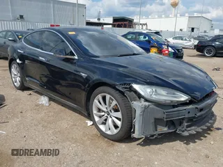 2014 Tesla Model S 60 z VIN 5YJSA1H1XEFP44397, wystawiony jako IAAI lot #42140917 z przebiegiem 136 515 mil mil oraz . Historia ofert i sprzedaży dostępna na DreamBid. Obrazek 1.