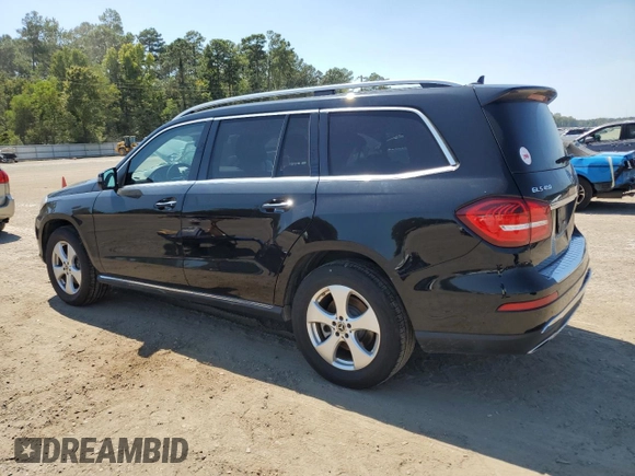 2018 Mercedes-Benz GLS with VIN 4JGDF6EE1JB084032, listed as a Copart auction lot 68464143 with 99,904 mi miles. Bid and sale history available at carsss.com. Image 2.