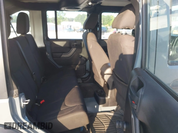 2014 Jeep Wrangler Unlimited Sport with VIN 1C4BJWDG5EL327225, listed as a IAAI auction lot 42547991 with 129,545 mi miles and . Bid and sale history available at DreamBid. Image 8.