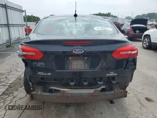 2016 Ford Focus SE z VIN 1FADP3F21GL262289, wystawiony jako Copart lot #60318515 z przebiegiem 79 529 mil mil oraz Szkoda całkowita • Salvage title. Historia ofert i sprzedaży dostępna na DreamBid. Obrazek 6.