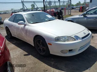 1997 Lexus SC 300 with VIN JT8CD32Z2V0039032, listed as a IAAI auction lot 42556454 with 164,629 mi miles and . Bid and sale history available at DreamBid. Image 1.