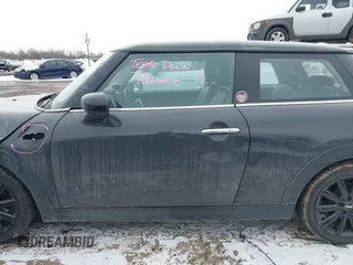 2020 MINI Hardtop Cooper S z VIN WMWXR5C07L2L60692, wystawiony jako IAAI lot #41621462 z przebiegiem 66 898 mil mil oraz . Historia ofert i sprzedaży dostępna na DreamBid. Obrazek 15.