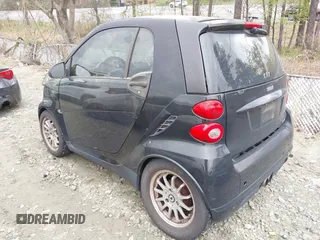 2009 Smart fortwo Pure with VIN WMEEJ31X69K244948, listed as a IAAI auction lot 41925643 with 129,877 mi miles and . Bid and sale history available at DreamBid. Image 3.