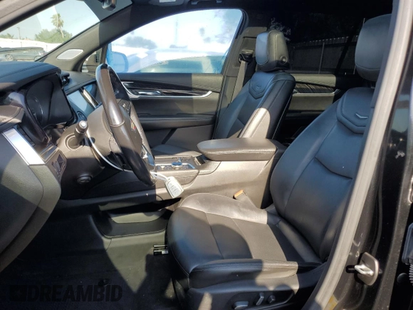 2020 Cadillac XT6 FWD Premium Luxury с VIN 1GYKPCRSXLZ174002, выставлен на аукционе Copart как лот 52083235 с пробегом 79 712 миль миль и Списание • Salvage title. История ставок и продаж доступна на DreamBid. Изображение 7.