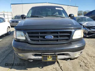 2002 Ford F-150 XL with VIN 1FTRF18232NA58109, listed as a Copart auction lot 79080674 with 148,213 mi miles and Salvage title. Bid and sale history available at DreamBid. Image 5.