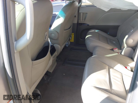 2015 Toyota Sienna XLE with VIN 5TDYK3DC8FS547056, listed as a IAAI auction lot 41387793 with 140,767 mi miles and . Bid and sale history available at DreamBid. Image 8.