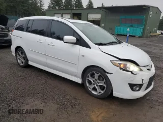 2009 Mazda 5 Grand Touring with VIN JM1CR293990341566, listed as a Copart auction lot 44239225 with 149,493 mi miles and Salvage title. Bid and sale history available at DreamBid. Image 4.