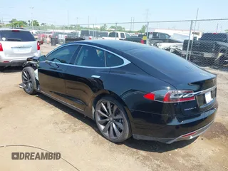 2013 Tesla Model S Performance with VIN 5YJSA1CP5DFP25346, listed as a IAAI auction lot 42463047 with 112,909 mi miles and . Bid and sale history available at DreamBid. Image 3.