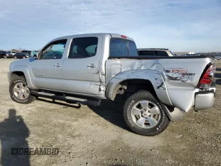 2011 Toyota Tacoma PreRunner with VIN 3TMJU4GN7BM114871, listed as a Copart auction lot 87256214 with 214,236 mi miles and Salvage Title. Bid and sale history available at DreamBid. Image 2.