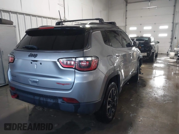 2019 Jeep Compass Trailhawk with VIN 3C4NJDDB9KT765459, listed as a IAAI auction lot 41319891 with 83,860 mi miles and . Bid and sale history available at carsss.com. Image 4.