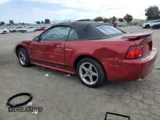 2003 Ford Mustang GT Deluxe with VIN 1FAFP45X13F412731, listed as a Copart auction lot 43479025 with 196,519 mi miles and Salvage Title. Bid and sale history available at carsss.com. Image 2.