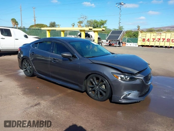 2016 Mazda 6 i Grand Touring with VIN JM1GJ1W57G1479543, listed as a IAAI auction lot 41371653 with 83,741 mi miles and . Bid and sale history available at carsss.com. Image 1.