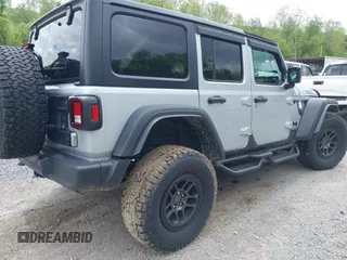 2023 Jeep Wrangler Sport S с VIN 1C4HJXDN0PW511682, выставлен на аукционе IAAI как лот 42199890 с пробегом 29 061 миль миль и . История ставок и продаж доступна на DreamBid. Изображение 4.