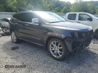 2014 Jeep Grand Cherokee Summit with VIN 1C4RJFJT4EC346946, listed as a Copart auction lot 60613025 with 50,565 mi miles and Salvage title. Bid and sale history available at DreamBid. Image 4.