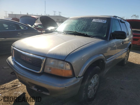 1999 GMC Jimmy SLE with VIN 1GKDT13W1X2537011, listed as a Copart auction lot 76623754 with 212,083 mi miles and Salvage Title. Bid and sale history available at carsss.com. Image 1.