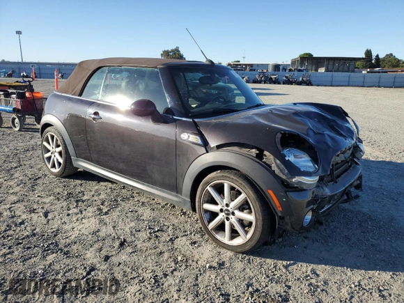 2015 MINI Convertible with VIN WMWZN3C53FT862859, listed as a Copart auction lot 71419764 with 113,356 mi miles and Salvage title. Bid and sale history available at DreamBid. Image 4.