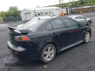2014 Mitsubishi Lancer SE with VIN JA32V2FW5EU005615, listed as a IAAI auction lot 42204917 with 141,285 mi miles and . Bid and sale history available at carsss.com. Image 4.