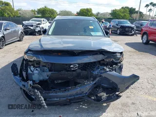 2024 Mazda CX-50 S Select with VIN 7MMVABAM5RN208388, listed as a IAAI auction lot 41301055 with 9,815 mi miles and . Bid and sale history available at DreamBid. Image 6.