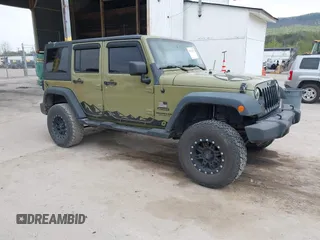 2013 Jeep Wrangler Unlimited Sport z VIN 1C4BJWDG1DL702137, wystawiony jako IAAI lot #42122927 z przebiegiem 162 492 mil mil oraz . Historia ofert i sprzedaży dostępna na DreamBid. Obrazek 1.
