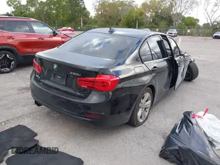 2017 BMW 3 Series 330i with VIN WBA8B9C38HK885309, listed as a IAAI auction lot 41579236 with 63,210 mi miles and . Bid and sale history available at DreamBid. Image 4.